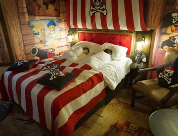 Children Sleeping in parent's bed in Premium Pirate Room at the LEGOLAND Resort Hotel